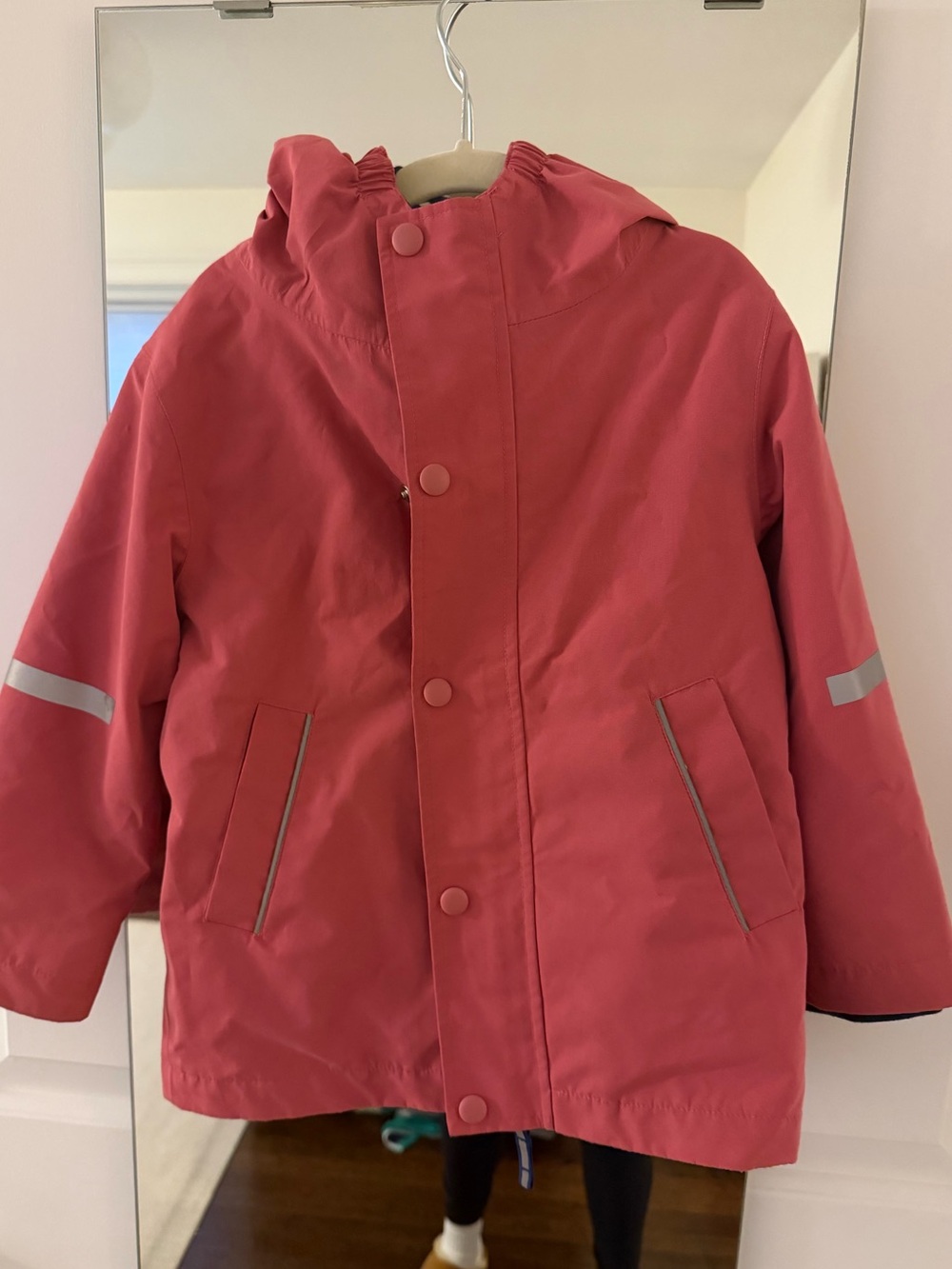 Mini Boden Pink Hooded Kids Raincoat with navy and white striped interior
